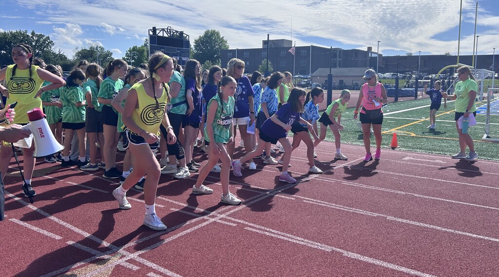students standing in line to race