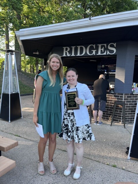 Kim Mahoney receiving an award from Shape PA