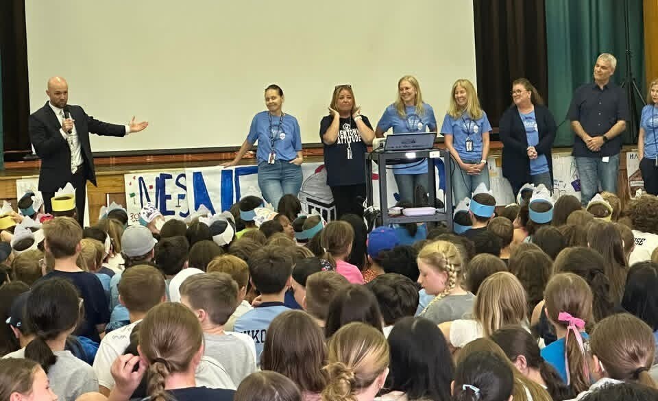 Principal Francis introducing staff
