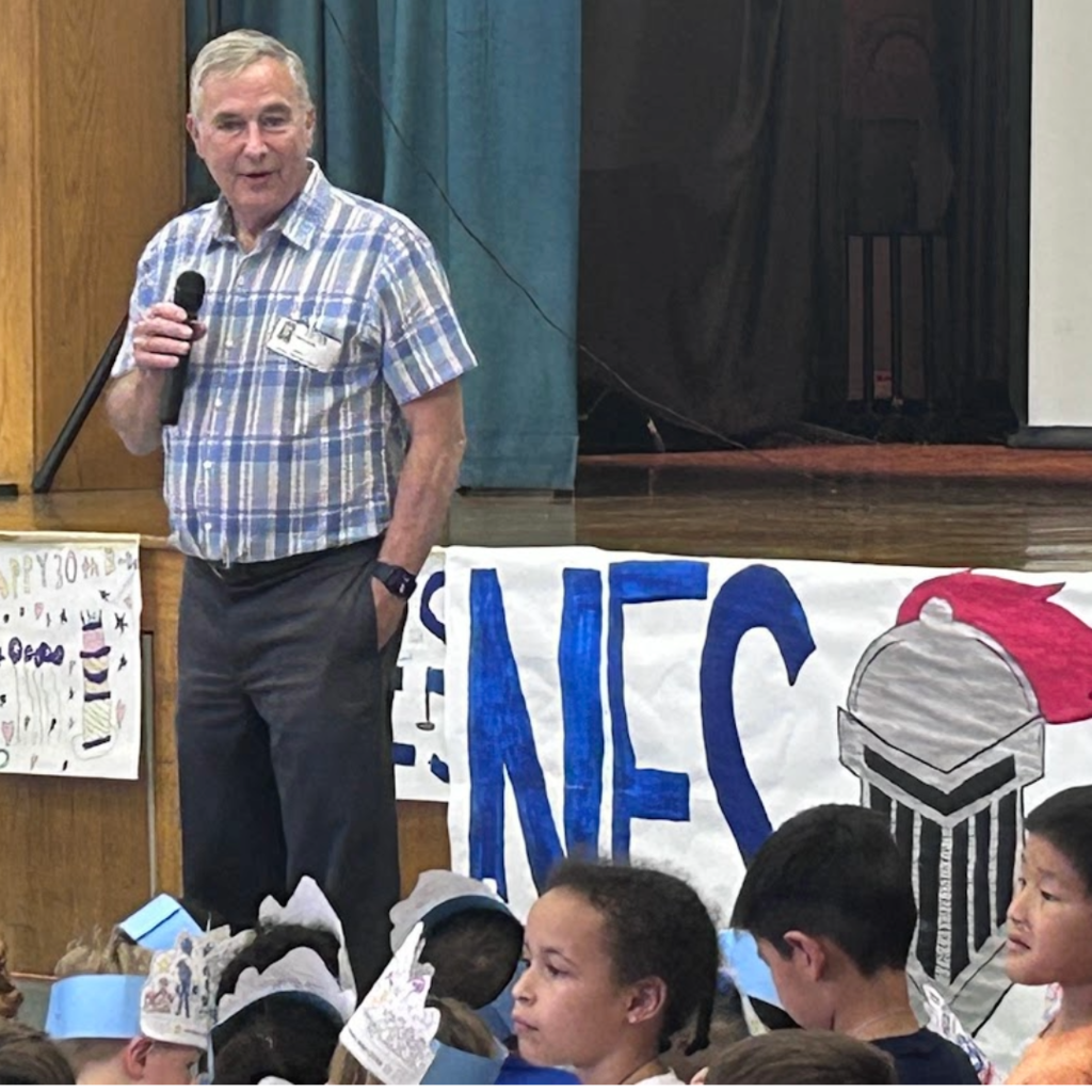 Superintendent Klein addressing students of Newtown Elementary