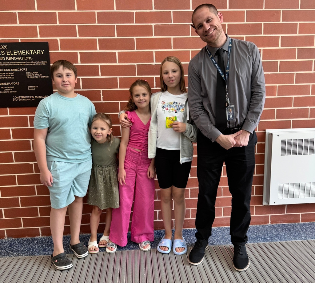 principal and 4 students at the end of school year