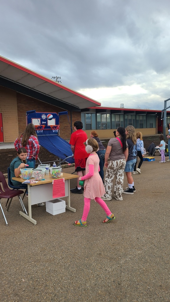 Children visit stations in front of the elementary school