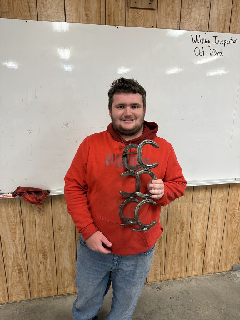 student and horseshoe welding