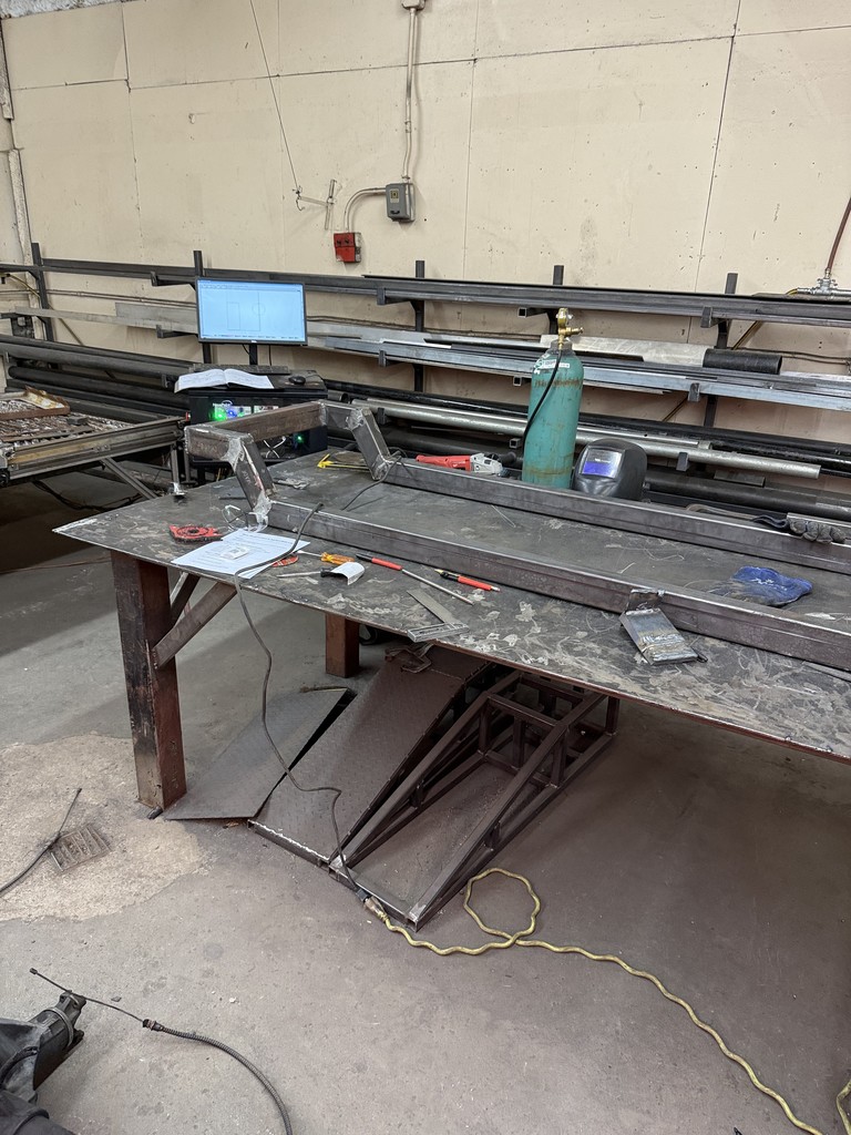 Metal fab table with rat-rod frame.