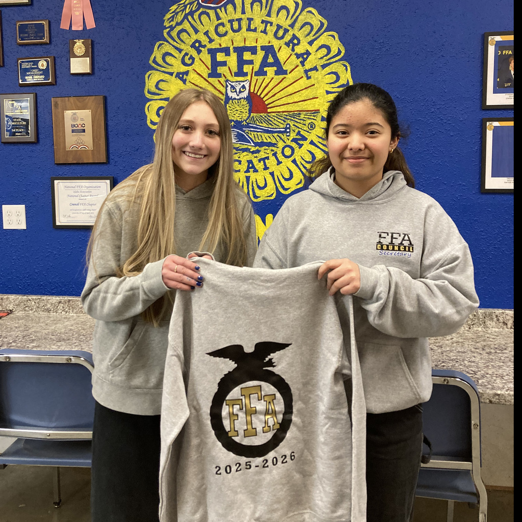 Rees Roberts being awarded a FFA sweatshirt by Isabel Duncan. 