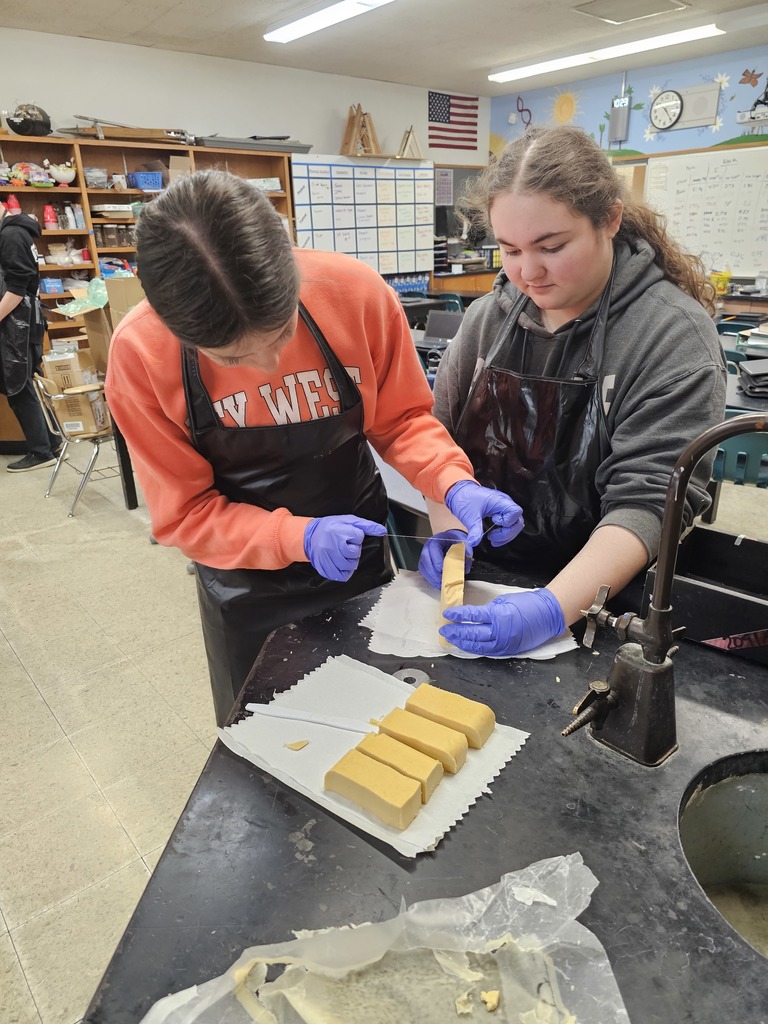 students cut soap
