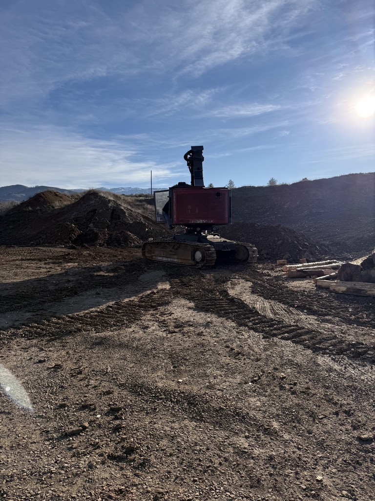 students and logging equipment