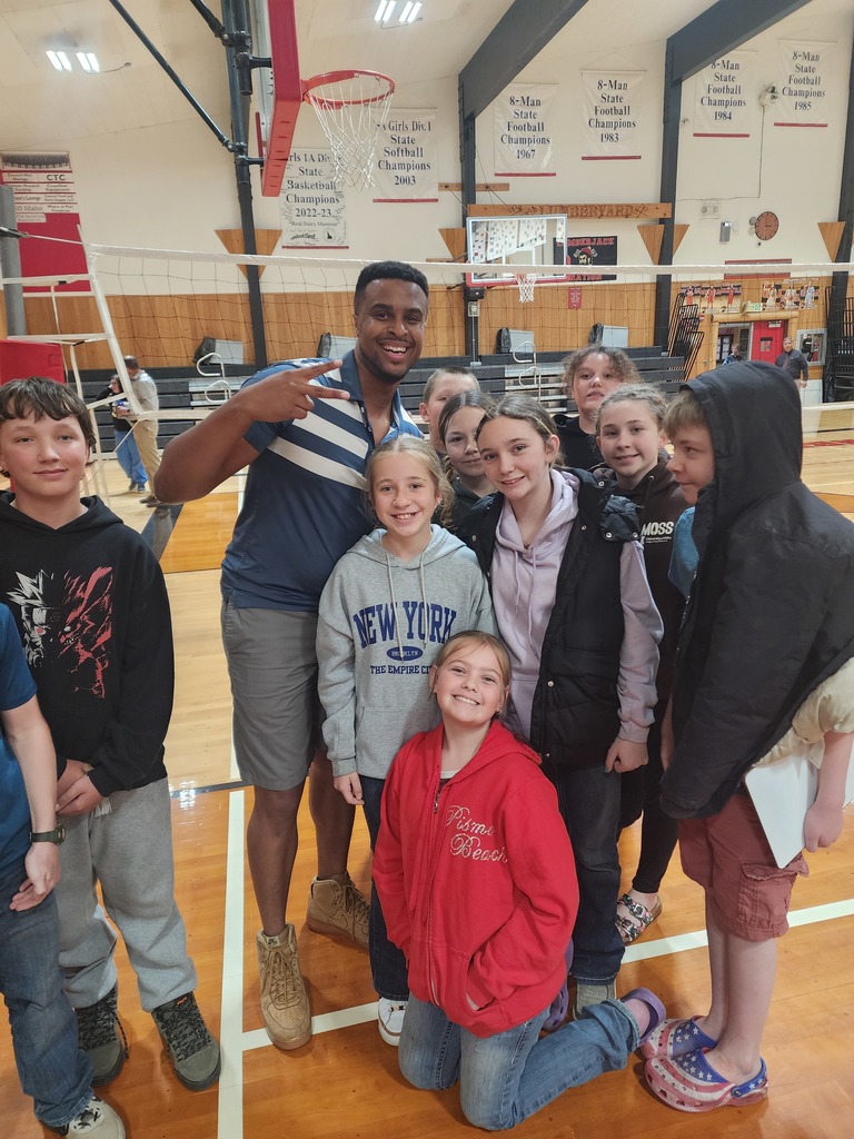 students pose with guest speaker
