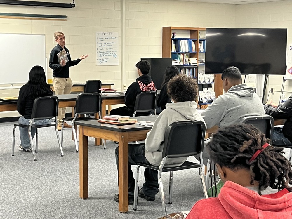 Speaker talking to students