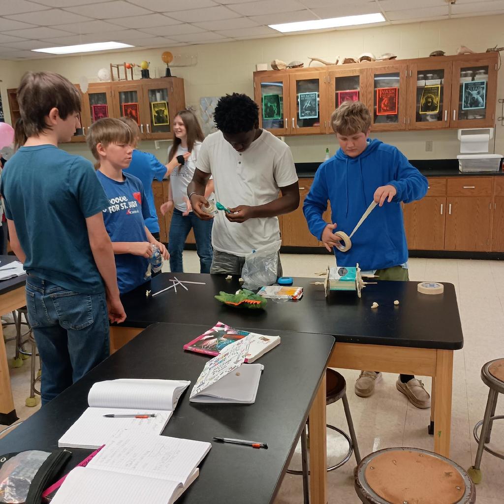 students with balloons