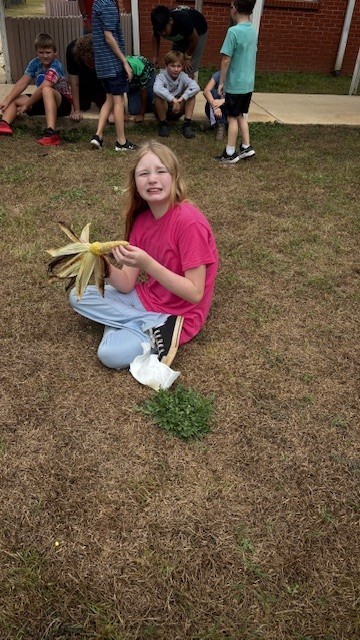 enjoying roasted corn