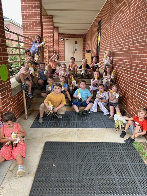 enjoying roasted corn