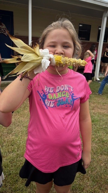 enjoying roasted corn