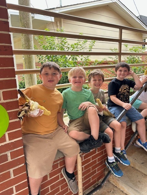 enjoying roasted corn