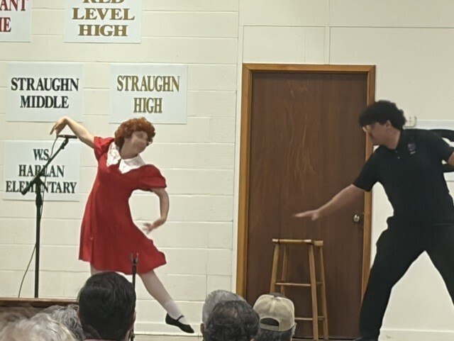 Annie and "Daddy" Warbucks 