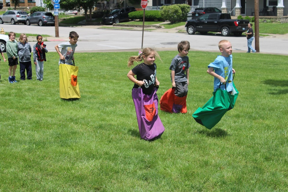 students participating in the sack race