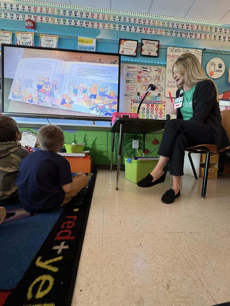 Woman teaching children