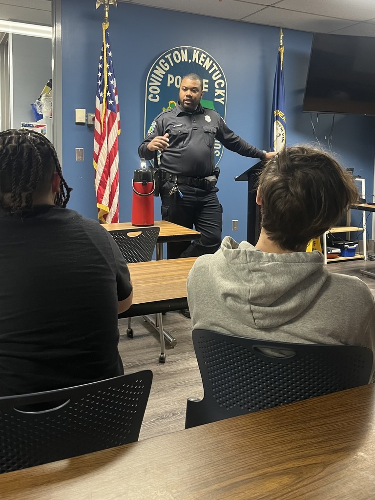 Officer Joshua Knott speaking to Work-Based Mentee Students