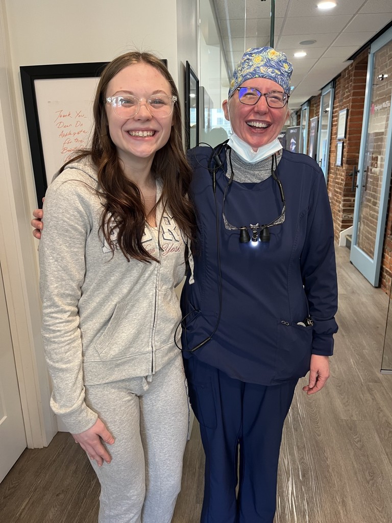 Student Aubree Grabow standing alongside Work Based Mentor