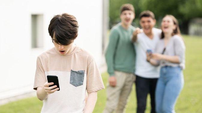 Child looking at a mobile phone