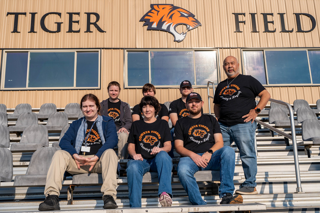 IT team photo on football field