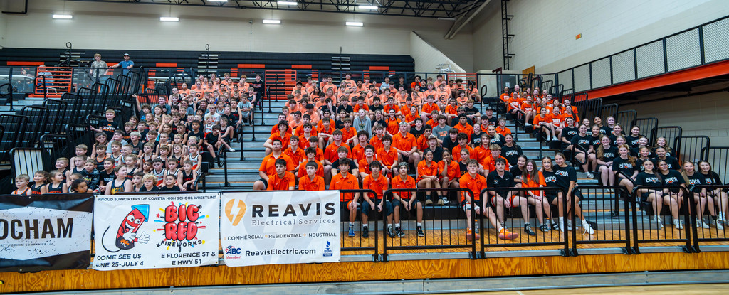 stand full of young wrestlers