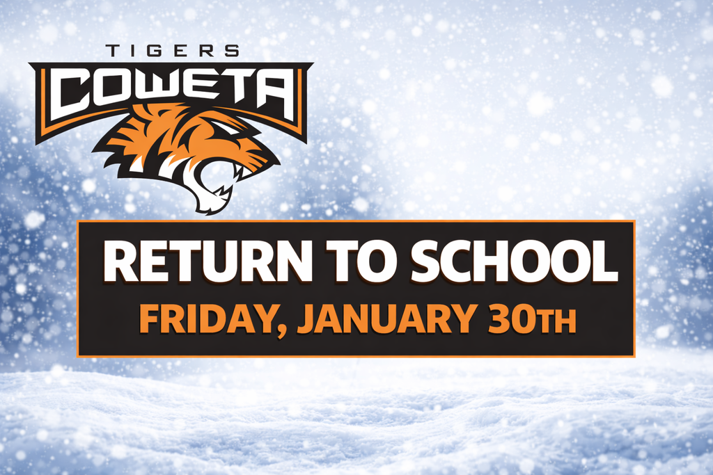 Snowy field with a message about school being open