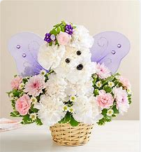 magical puppy with butterfly wings floral arrangement