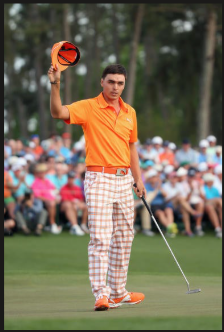 golf boy in orange