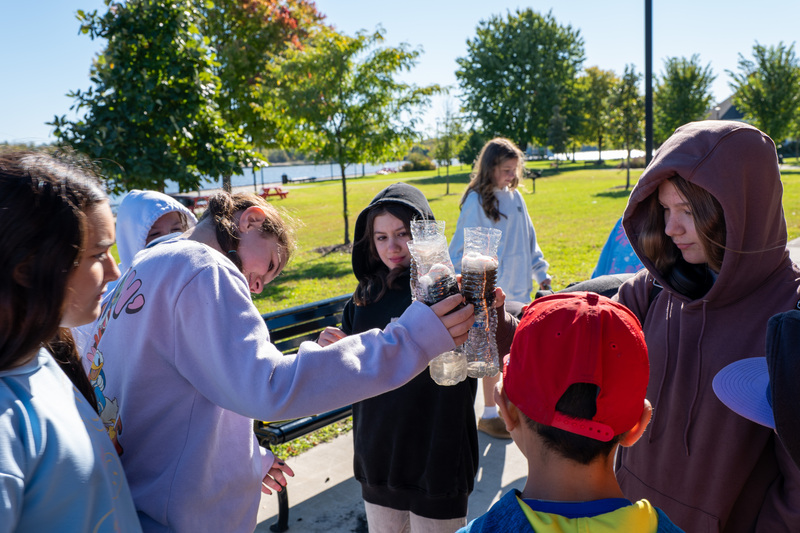 students looking at make shift water filters
