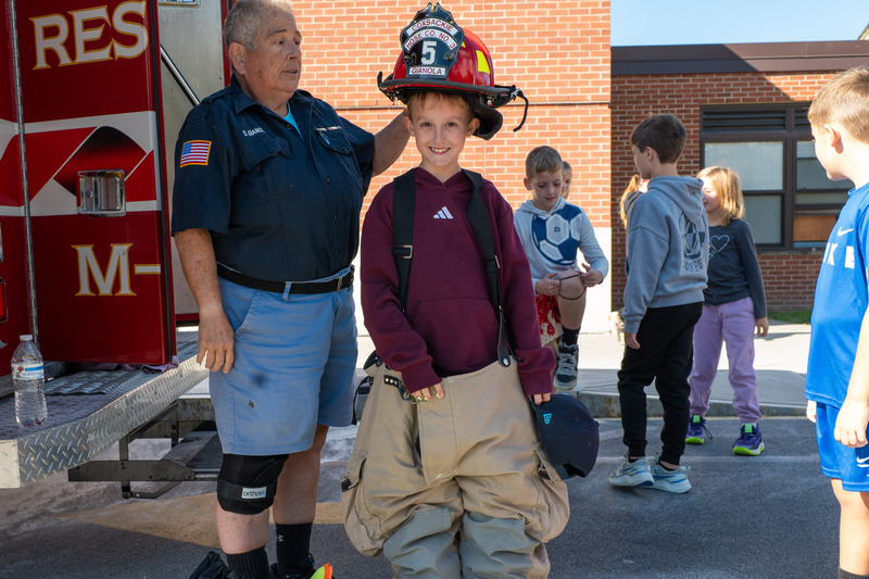 student wearing fight fighter gear