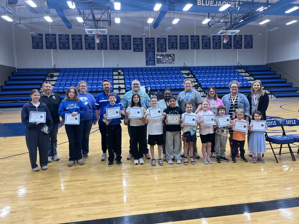 Students of the month and their teachers.
