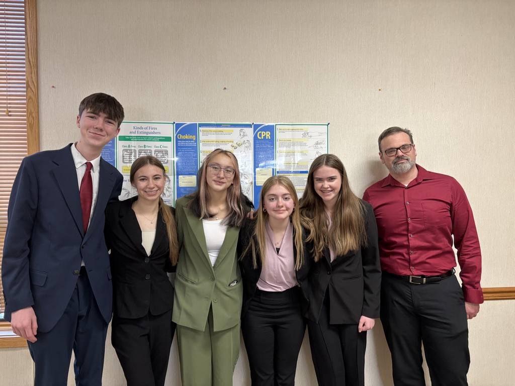 CHS Speech Members and Coach Woody Blackmore attend and perform at the monthly Cozad Rotary meeting