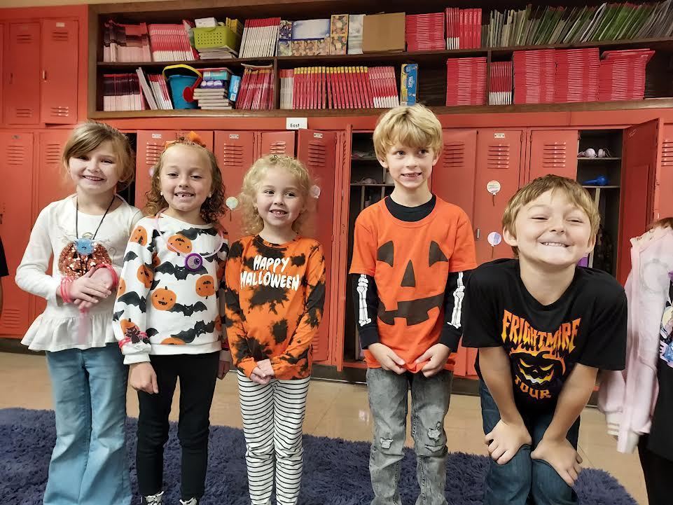 first grade halloween dress up in pumpkin colors