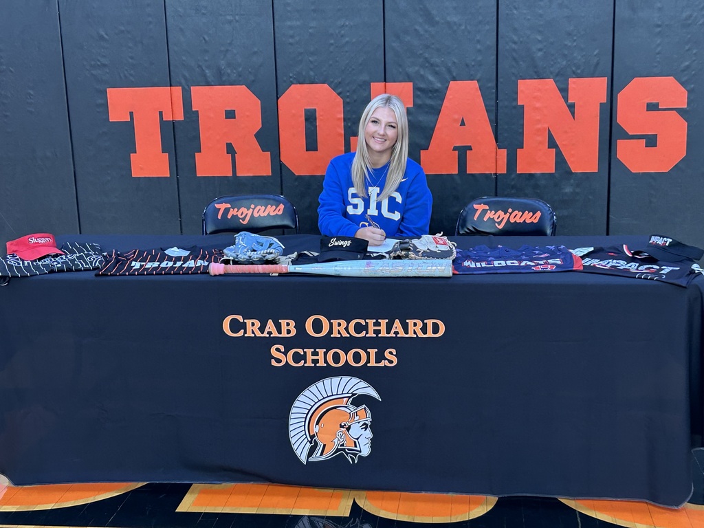 Player in blue shirt singing for college 