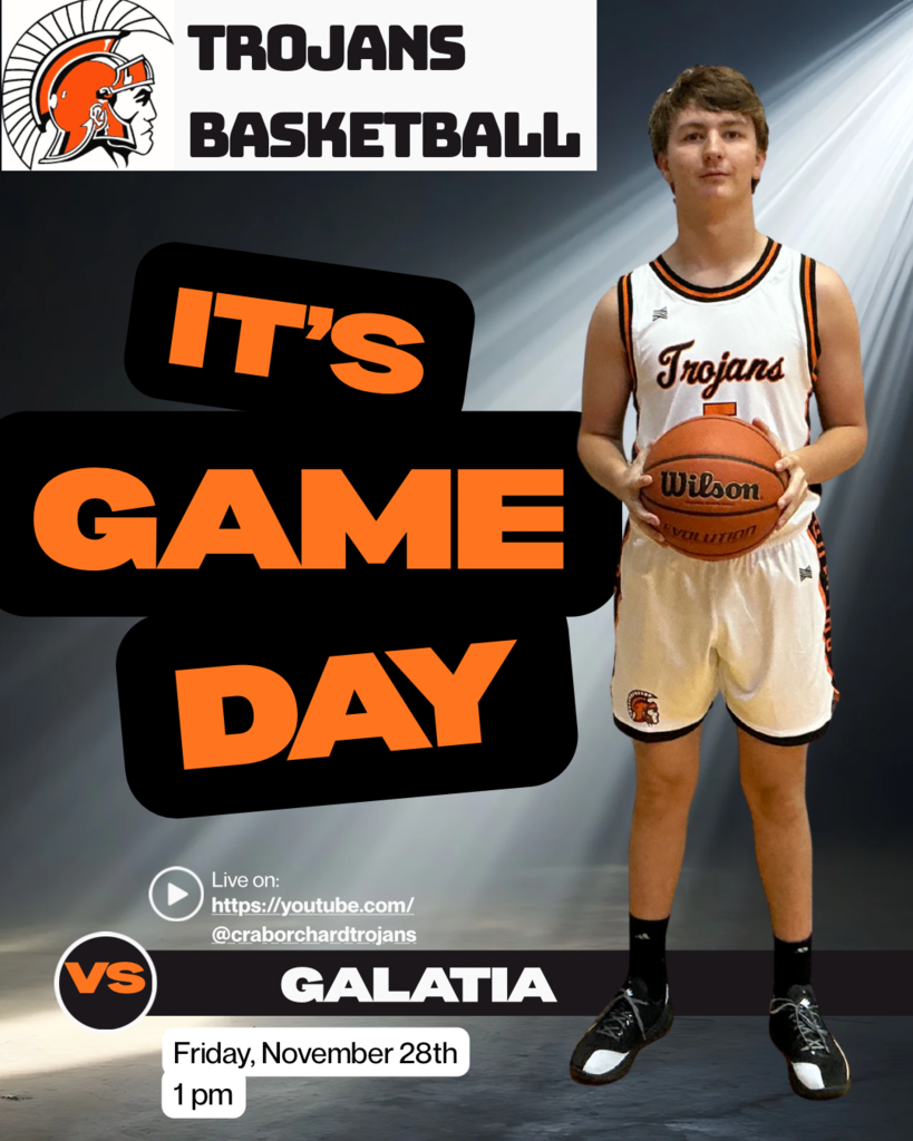 Game day photo. Vs Galatia. Player in white uniform holding ball. 