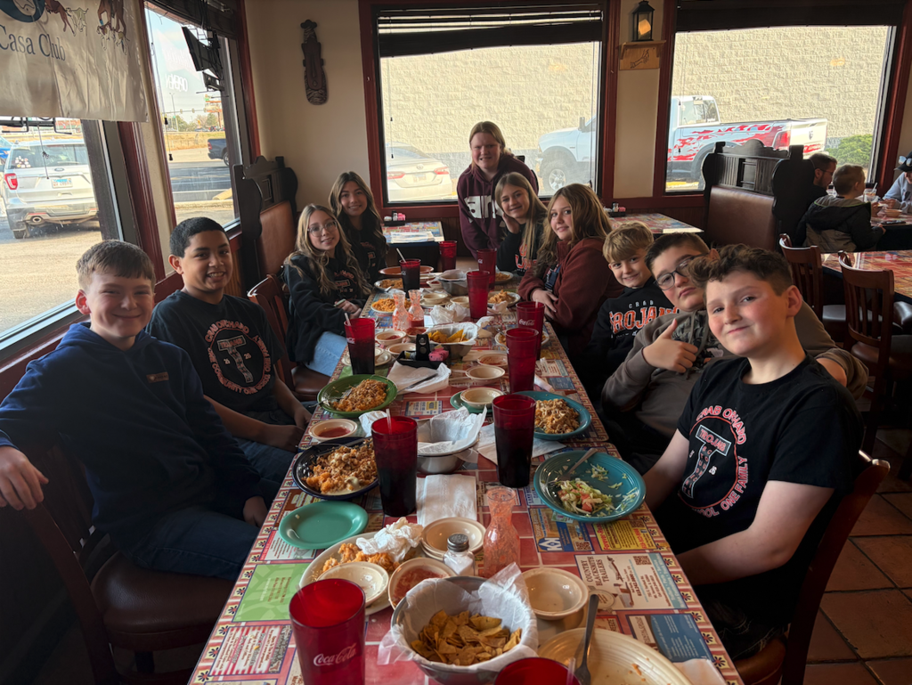 JH student council eating food at a table together
