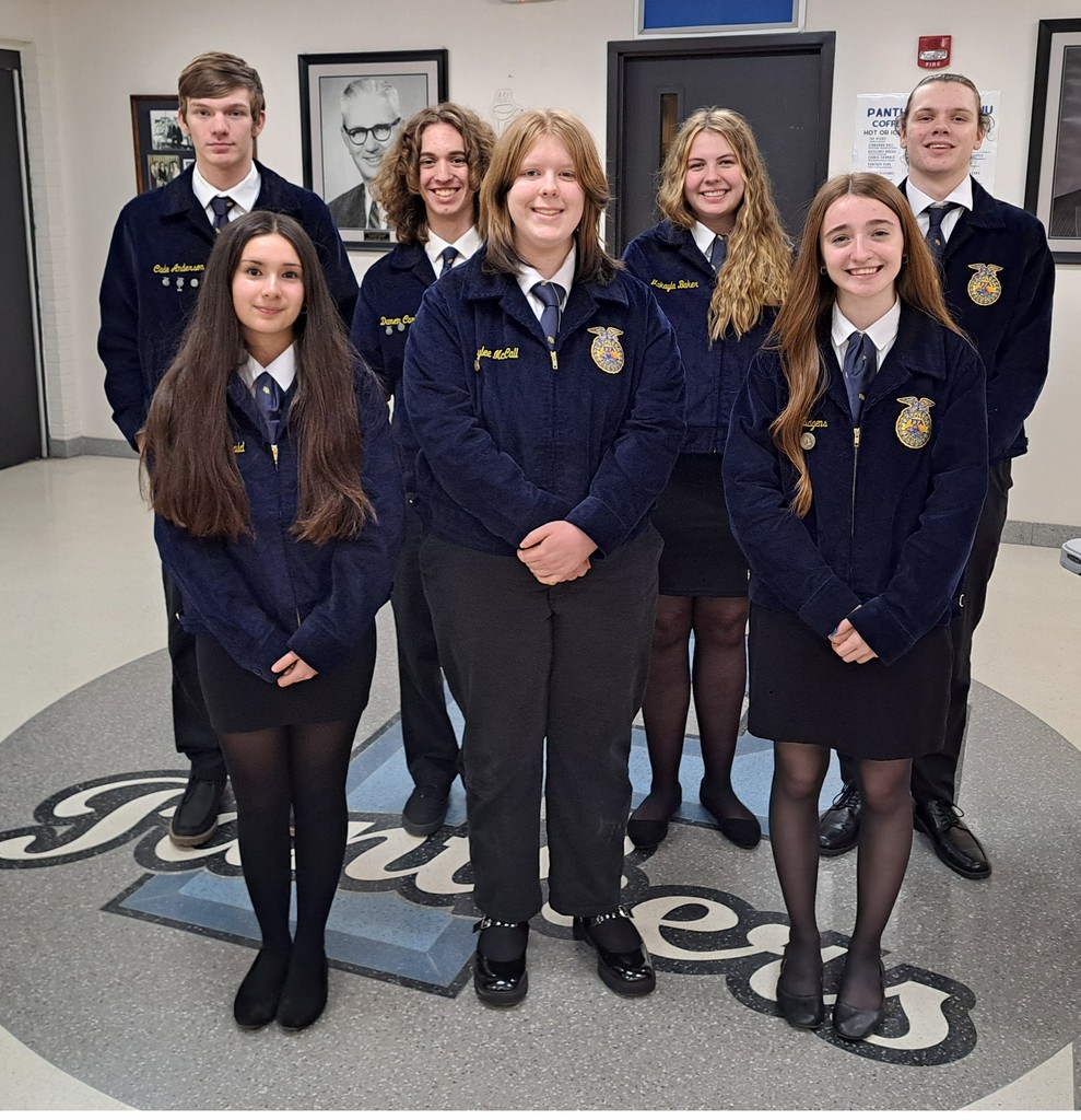 male & female students in FFA formal dress