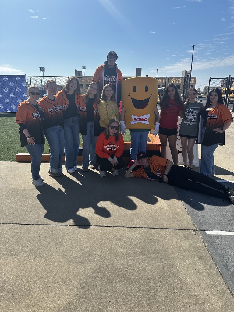 Group of students standing with yellow sonic mascot