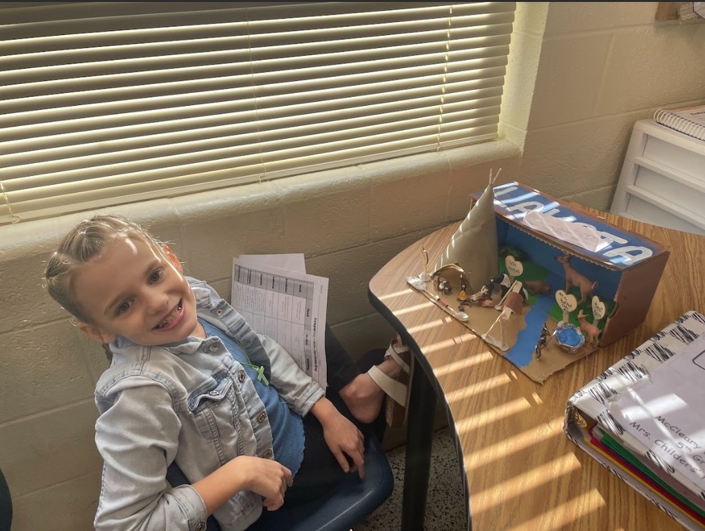 Little girl smiling at the camera