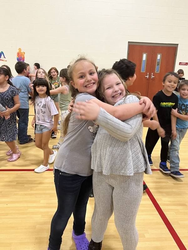 Kids in group at dance party 