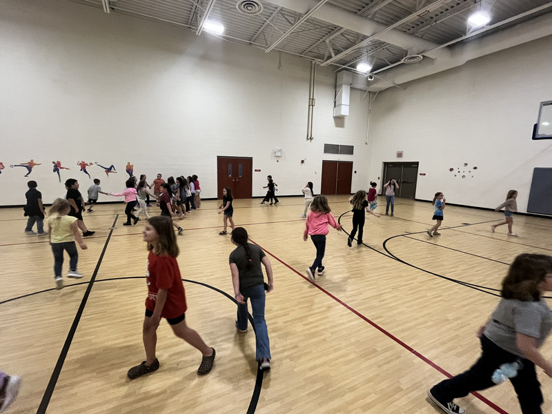 Kids in group at dance party 