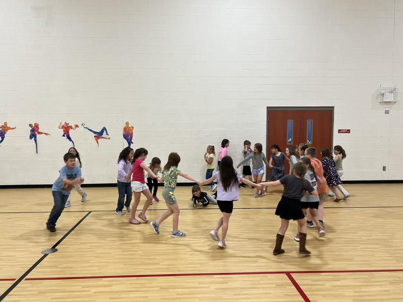 Kids in group at dance party 