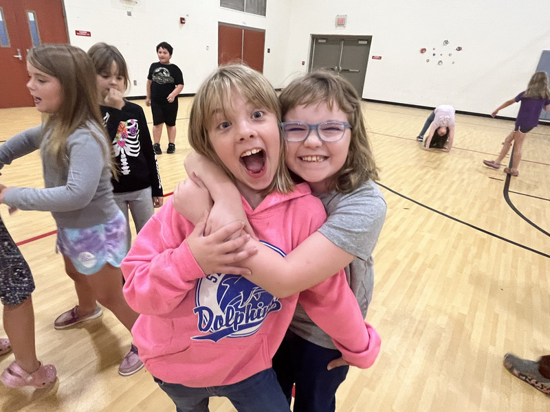 Kids in group at dance party 