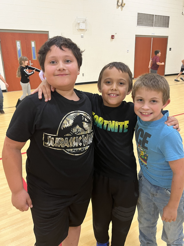 Kids in group at dance party 