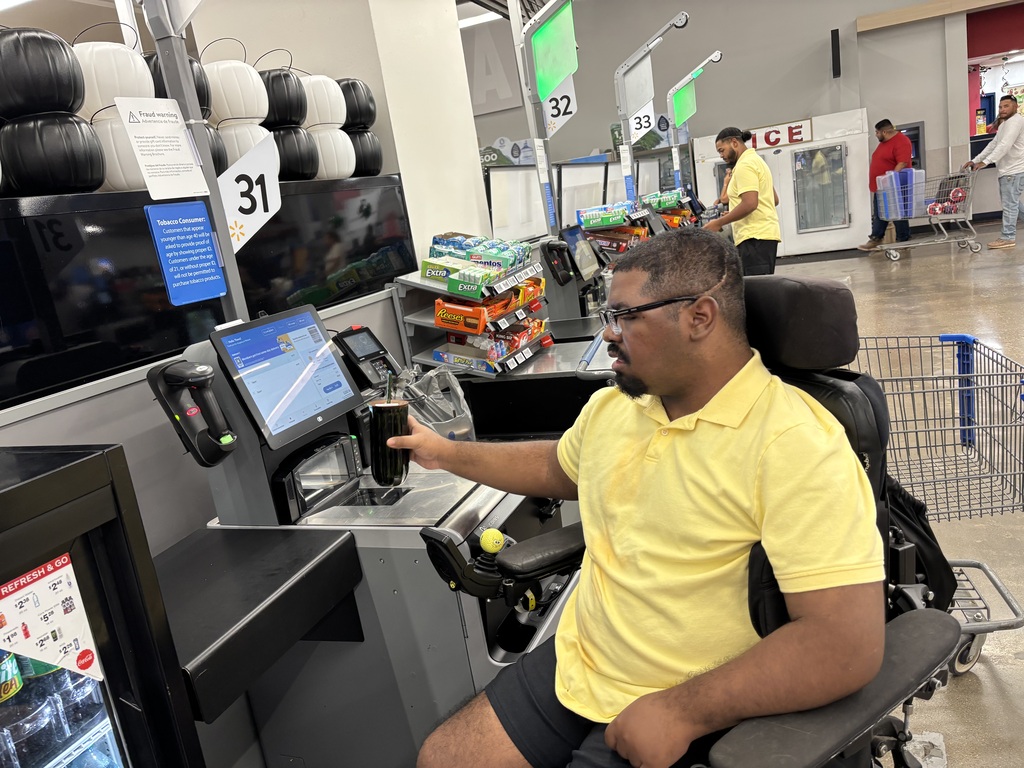 Lifeskill's student checking out at Sam's
