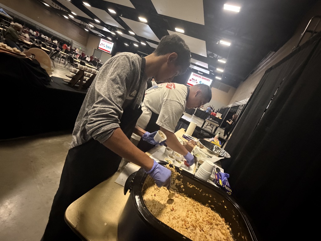 Jahyr Gonzalez Rodriguez & Luis Olmos prepping our Mexican Street Corn
