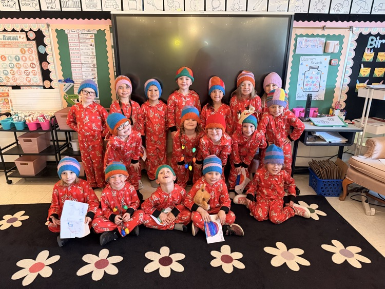 class photo with their new hats