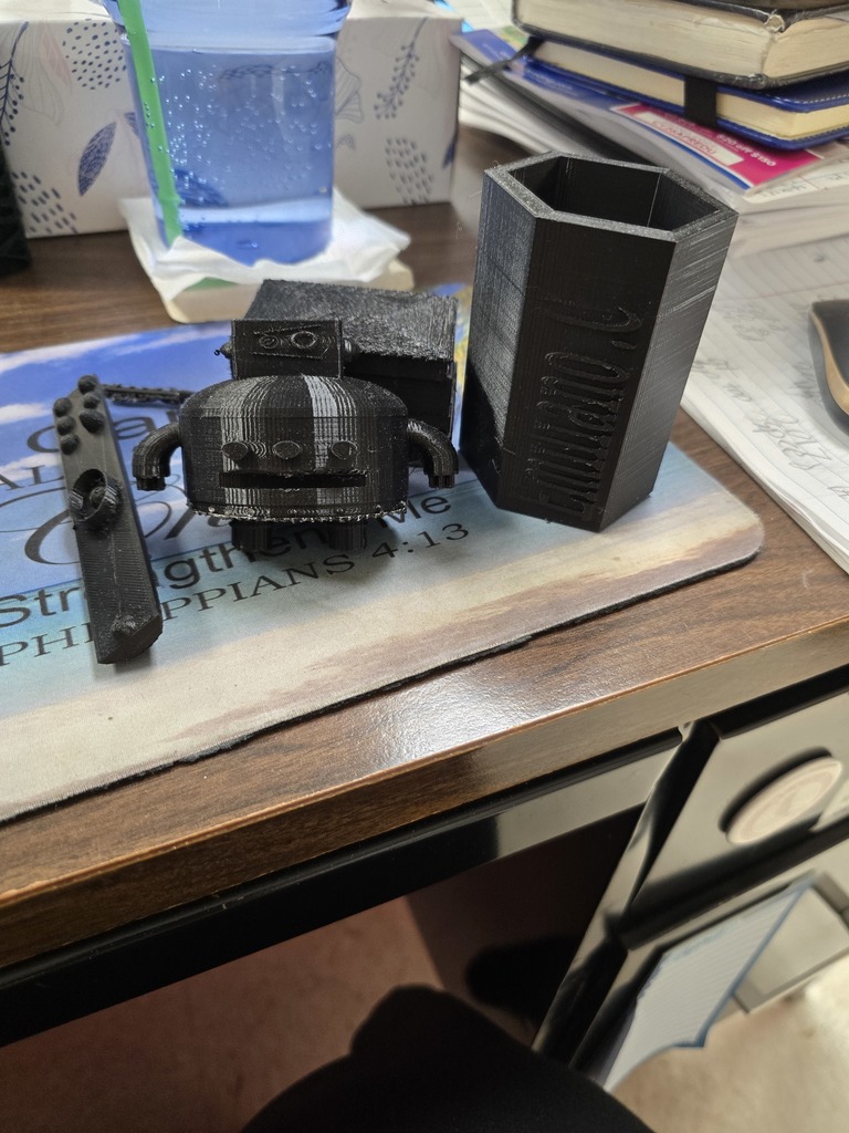 Ocean cleaner, programmable robot, programmable remote, and pencil cup.