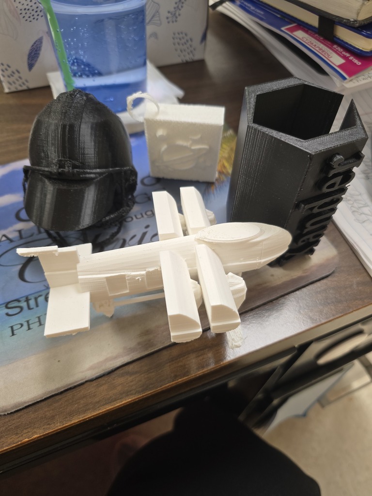 Safe Landing Airplane, Video Football Visor, Printer and Pencil cup.